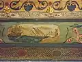 Painted decoration in the ceiling of one of the patio's porticoes