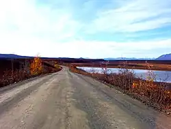 The Denali Highway has only 23 miles (37&nbsp;km) of pavement, the remaining 123 miles (198&nbsp;km) is gravel. The road is closed in the winter months.