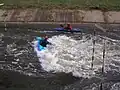 Features of the Channel. Side-surfing in the Middle Hole at full flow 600&nbsp;cu&nbsp;ft/s (17&nbsp;m3/s).