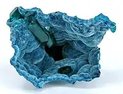 Dioptase on Shattuckite, Kaokoveld Plateau, Kunene Region, Namibia. Size: 2.5 × 2.1 × 2.0&nbsp;cm