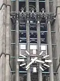Dwarf gargoyles on the outside of the building