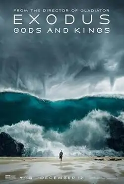 A man walks in the sand in front of a giant wave, with numerous tornadoes forming behind it.
