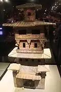 Painted elements can be seen on Han dynasty pottery tower.