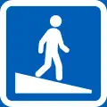 Overpass or underpass without steps (formerly used )