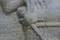Close-up of the left hand holding the mace