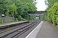 Two footbridges beyond the northern end of the station.