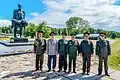 A foreign delegation from Azerbaijan, China, Russia, Kazakhstan and Uzbekistan at the memorial (specifically the statue of Yuzif Kaminsky)