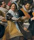 Captain Michiel de Wael about the same age, holding out his empty glass, detail of Officers of the St. George Civic Guard, Haarlem in 1627