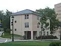 A newer fraternity house complex designated as Building 5