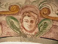 Putto, mural on the passage to the stairwell