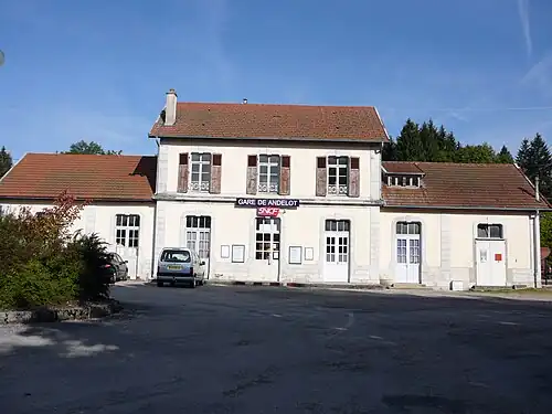 Two-story building with gabled roof