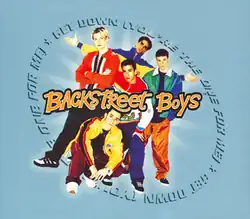 The band poses in front of a light blue background. The song title is written in a circular shape placed directly behind them.
