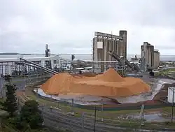 Image 47Storage Silos on the Gladstone waterfront, an industrial area in the water catchment area (from Environmental threats to the Great Barrier Reef)