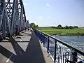 Cyclists crossing the outside lanes
