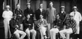 Group of men wearing striped shirt for cricket club photo group