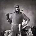Henry Lansdell in dress by foreign host