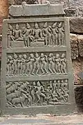 Hero stone with 11th- or 12th-century Old Kannada inscription in Kalleshvara temple in Bagali in Davangere district, Karnataka