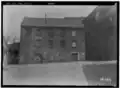 A 1934 view of the now-demolished grinding mill that stood roughly where the World War II memorial just to the northwest of where the Hyatt Regency is today