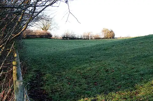 Sloping field where tramway once ran.