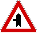 Junction with a minor side-road from left (also used )