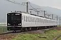 A 305 series set on the Chikuhi Line in January 2016