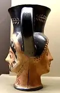 Side view of janiform kantharos with Heracles and woman (480–460 BC)