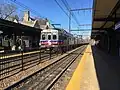 A Center City-bound train on the West Trenton Line stops at Jenkintown–Wyncote station in November 2017