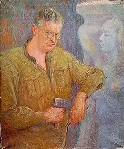 The Sculptor Fritz Behn&nbsp;[de] Working with a Hammer, ca. 1928.