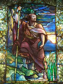 A window by Tiffany illustrating the development and use of multi-coloured flashed, streaky glasses at the end of the 19th century.