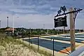 West Games Area featuring tennis courts