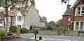 Another view of the junction of Divinity Road and Hill Top Road.