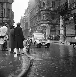 Közért grocery store on the corner of Krúdy utca and Rökk Szilárd utca, 1956. Now a G Roby supermarket.