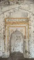 Arch and inscription inside Masjid