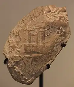 King-priest with bow fighting enemies, with horned temple in the center. Susa II or Uruk period (3800–3100 BC), found in excavations at Susa. Louvre Museum.[45][46]