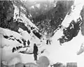 Klondikers with dogsled and supplies