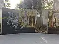Granite wall showing scenes from the campaign