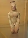 Kneeling kouros
