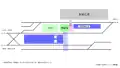 Schematic of station layout. Gray is the station forecourt. The narrow blue rectangle is the Miniami Aso platform, the thick blue is the JR Kyushu.