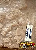 Burial 19. Blocks were on top of the skeleton.