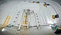 The Large Underground Xenon experiment installed 1,480 m (4,850 ft) underground inside the water tank shield.