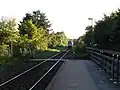 Entrance for track 2 (direction Roskilde) from a pathway along the station