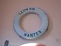 Life buoy Leon XIII present in church porch