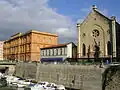 The church and the Fosso Reale, the latter also in need of restoration