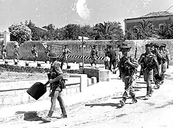 Troops of The Loyal Edmonton Regiment enter Modica during the Allied invasion of Sicily (1943)