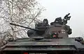 The turret of a German Army Luchs 2 armored reconnaissance vehicle showing a Rh 202 as the main armament.