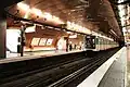 Parisian underground station of Arts & Métiers, founded in 1904, which is served by Line 3 and Line 11. For its renovation in 1988, the Ouï-dire style was applied to Line 3, whilst on Line 11, for the bicentenary anniversary of CNAM in 1994, the platforms were redesigned by Belgian comics cartoonist François Schuiten in a steampunk style reminiscent of the science fiction works of Jules Verne.[28]