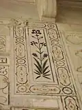 Decorations on the wall of Musamman Burj