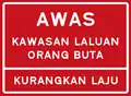 Blind people crossing