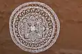 Mandana art work on the walls of Rajasthani mud huts from Shilpgram, Udaipur