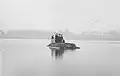 Mark IX Tank Amphibious Conversion in Welsh Harp Reservoir, with all of its passengers out on top